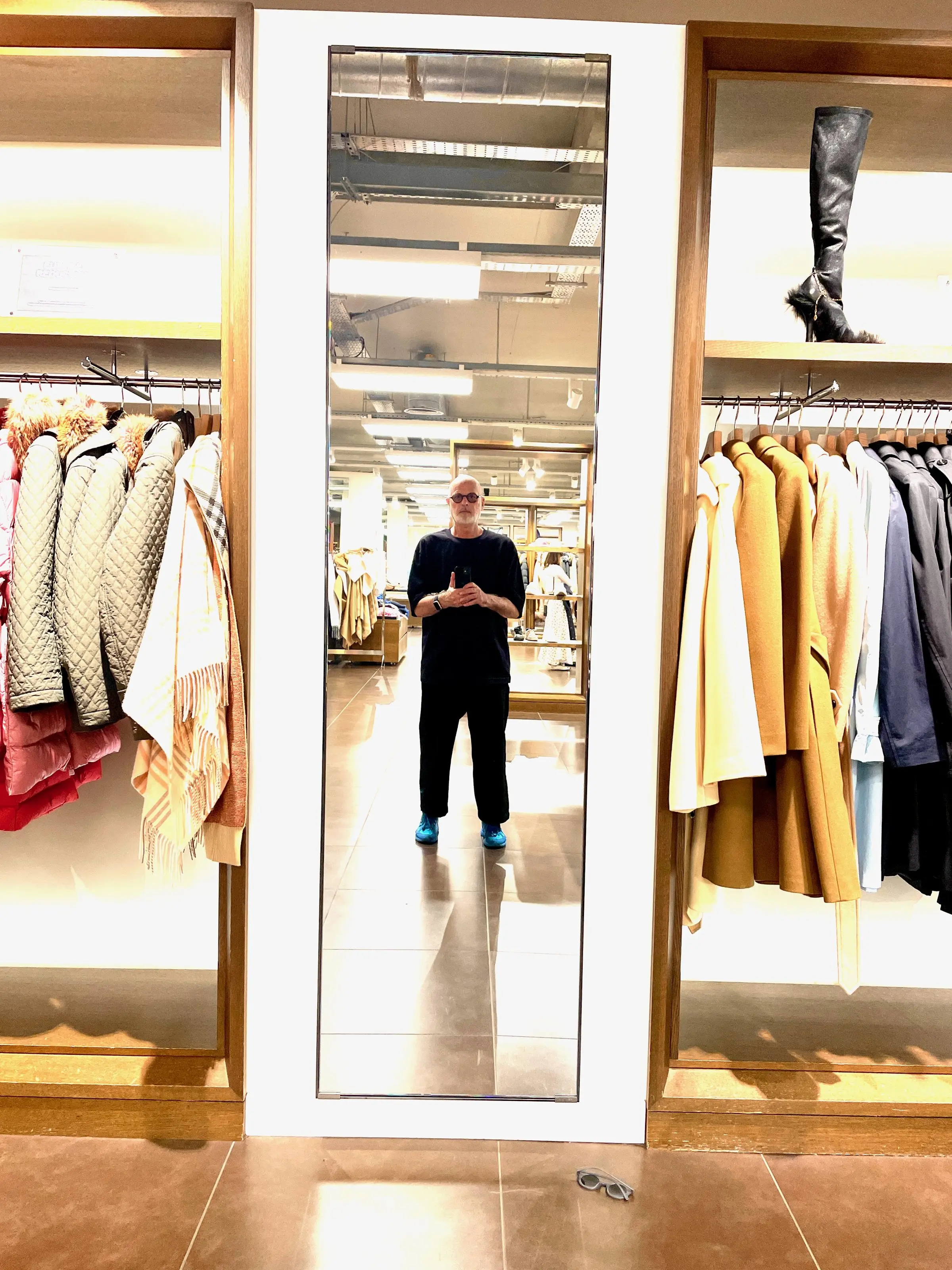Gary Reid, mirror selfie in a clothes shop